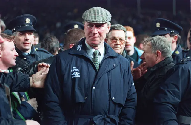 Charlton in manager's coat