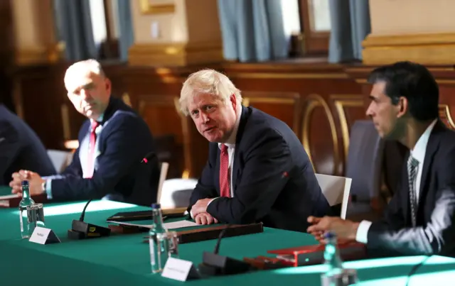 Boris Johnson speaks to his cabinet