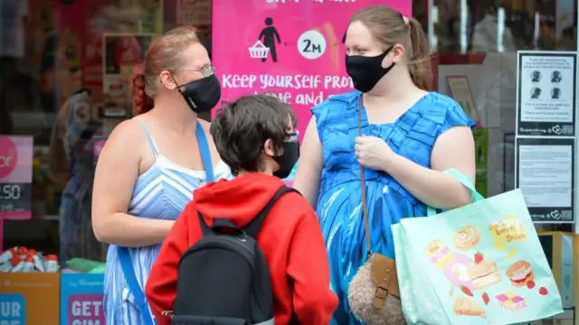 People wearing masks in Leicester