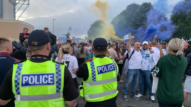 Police officers observe celebrations