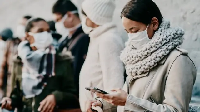 A woman checking her phone