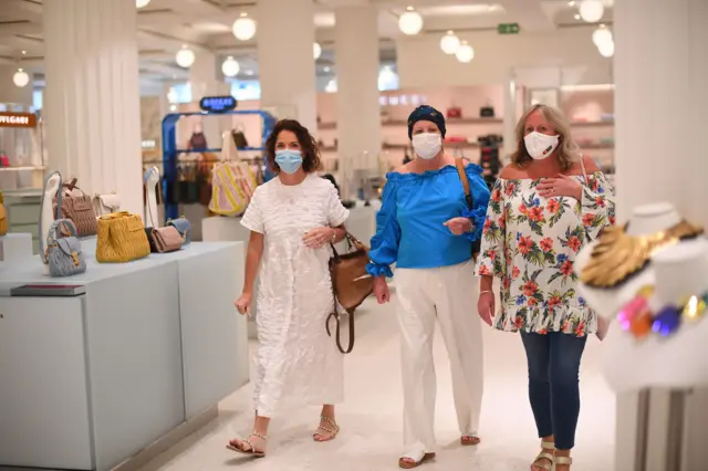 Shoppers wearing face masks