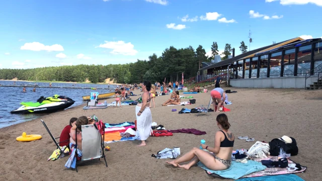 People on the beach at Lake Storsjon