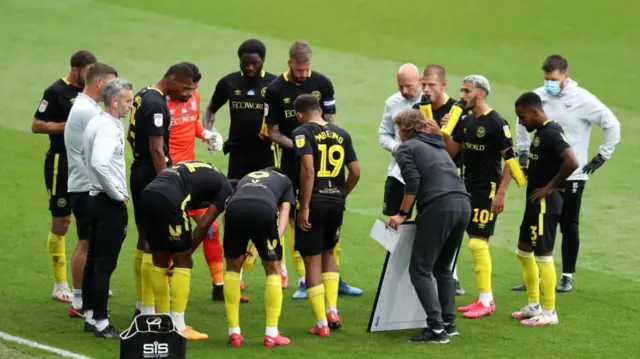 Brentford players have drinks break