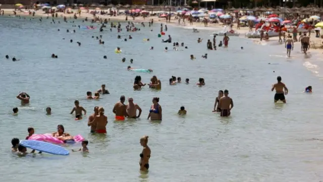 People in the sea on one of the Balearic Islands