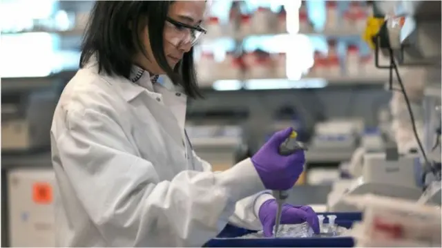 A scientist testing the vaccine