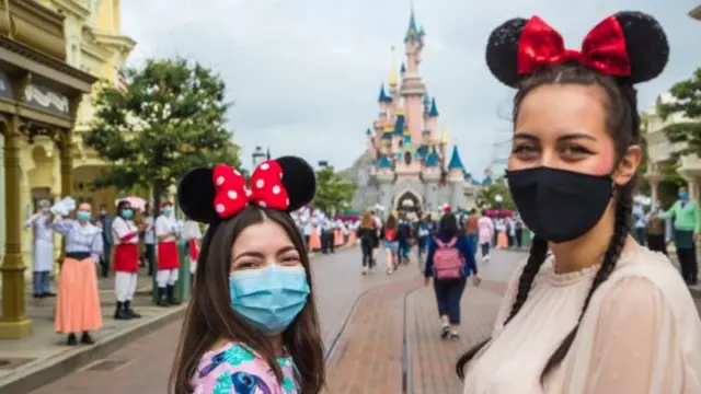 People at Disneyland Paris, which has reopened