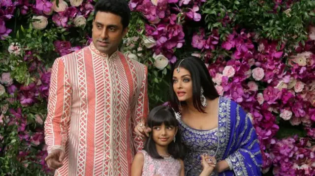 Image shows Abhishek Bachchan, Aishwarya Rai Bachchan and Aaradhya