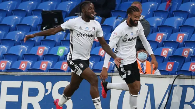 Josh Onomah celebrates