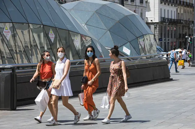 A group of shoppers walking in Madrid