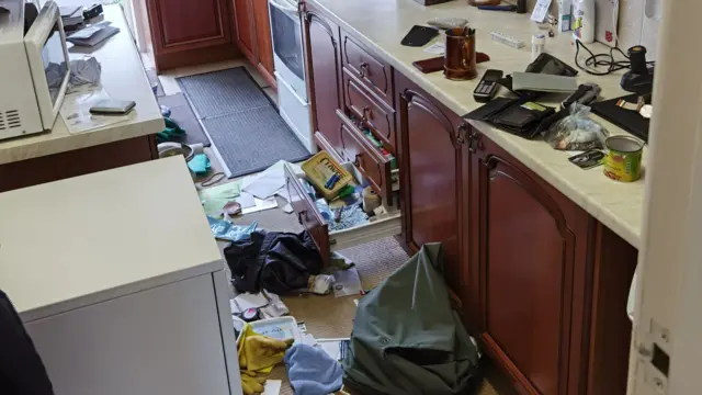 Part of her ransacked kitchen