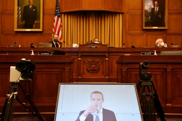 Mark Zuckerberg appears on screen at a hearing in Congress