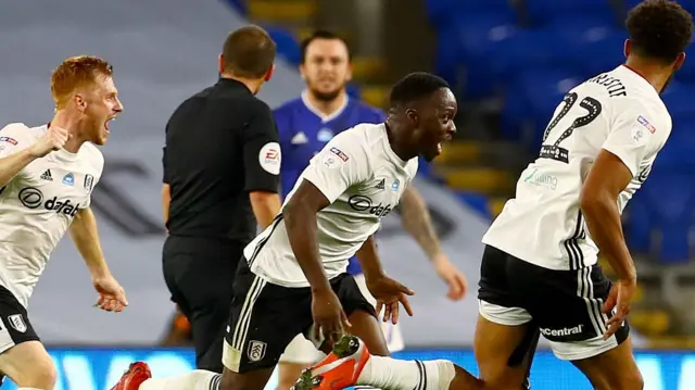 Neeskens Kebano (centre) celebrates his goal for Fulham against Swansea