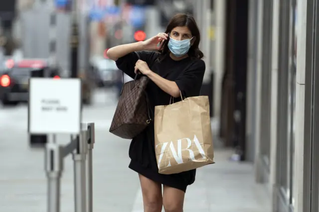 A woman wearing a face mask