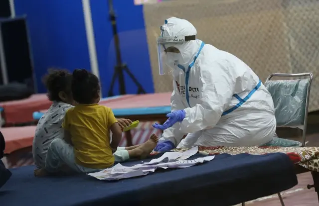 A doctor wearing protective equipment at a covid centre