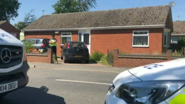 Police guard the scene