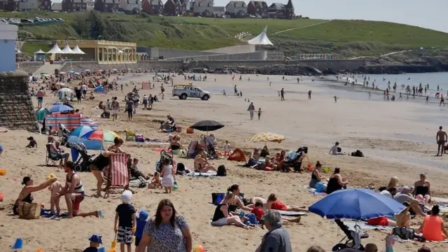 Crowds on beach at Barry Island, Vale of Glamorgan