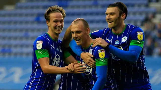 Wigan players celebrate