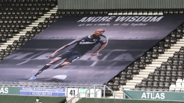 Andre Wisdom banner