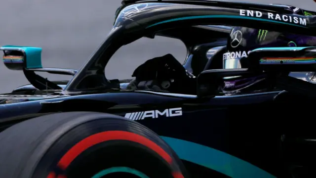 Lewis Hamilton Mercedes with the phrase 'end racism' on the halo device