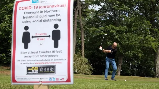 A golfer tees off at Masserene Golf Club in Antrim