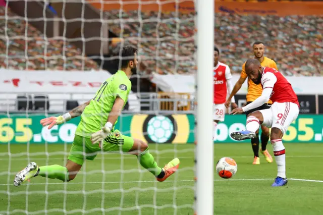 Alexandre Lacazette of Arsenal scores