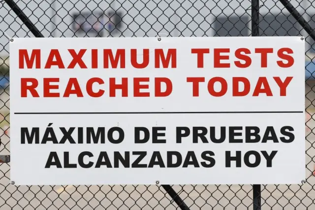 A sign posted "Maximum Tests Reached Today" in English and Spanish is seen at Delmar Stadium at a Covid-19 testing site amid the coronavirus pandemic in Houston, Texas, USA, 03 July 2020