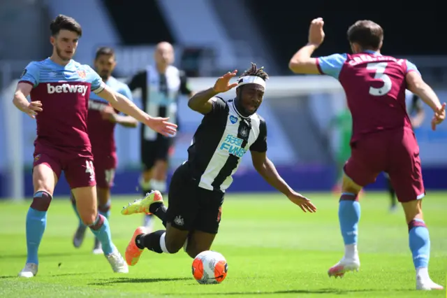 Allan Saint-Maximin is fouled by Declan Rice