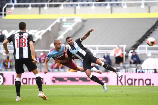 Tomas Soucek heads towards goal