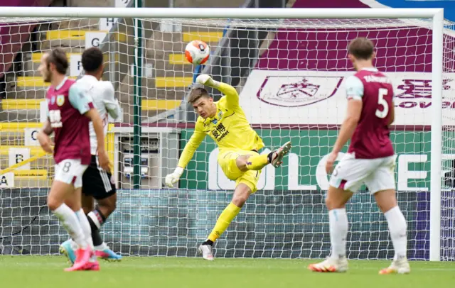 Nick Pope kicks the ball