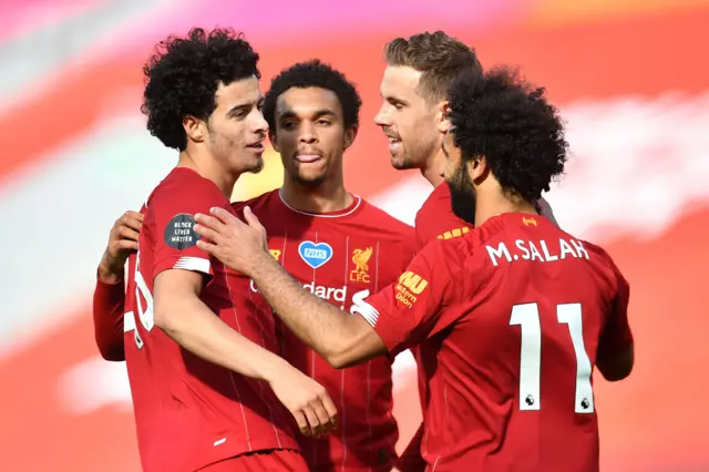 Curtis Jones and Liverpool celebrate