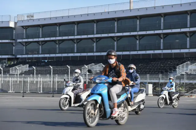 Image shows motorbikes in Hanoi