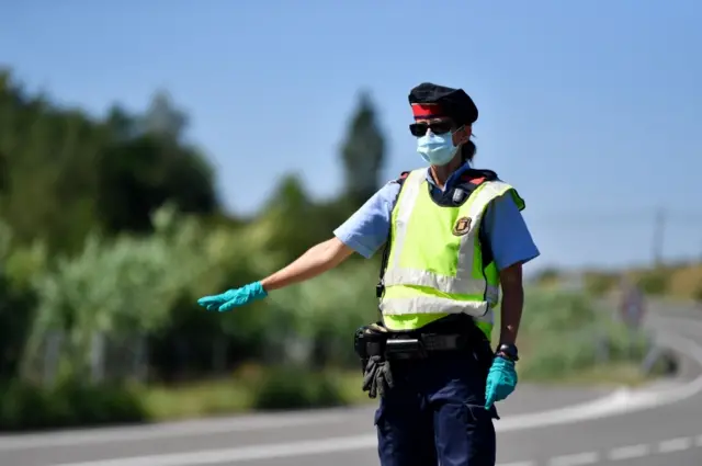 Police enforce a lockdown in Catalonia