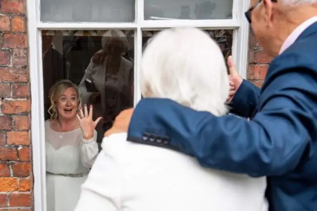 Tracie shows off her wedding ring