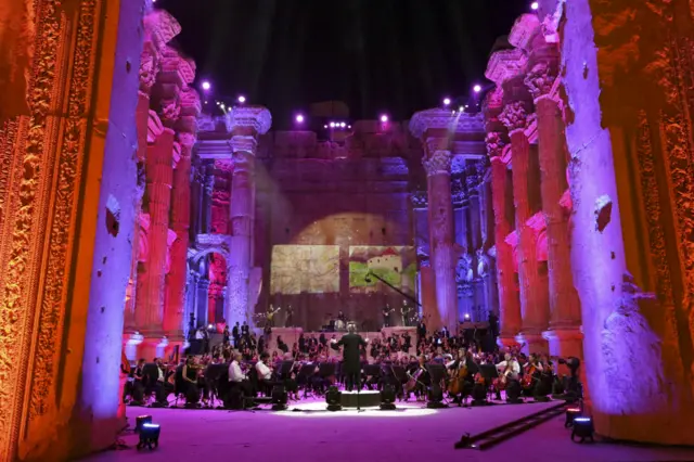 Maestro Harout Fazlian conducts rehearsals ahead of the Sound of Resilience concert inside the Temple of Bacchus