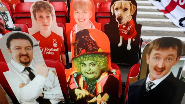 Cardboard cut-outs at the City Ground