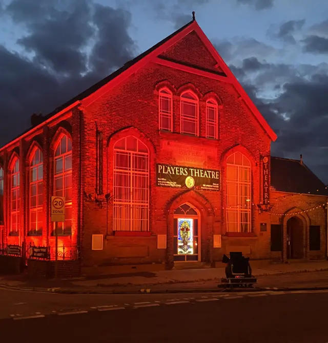 Players Theatre in red