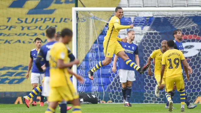 Ben Cabango celebrates scoring for Swansea