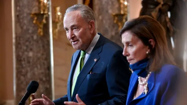 Senate Minority Leader Chuck Schumer, joined by Speaker of the House Nancy Pelosi, speaks to reporters in the U.S. Capitol in Washington, U.S. July 29, 2020