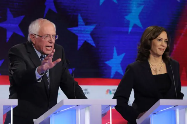 Sanders and Harris in the first Democratic primary debate, which was 14 months ago