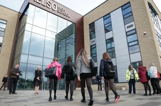 Pupils arrive at Kelso High School on the Scottish Borders as schools in Scotland start reopening on Tuesday