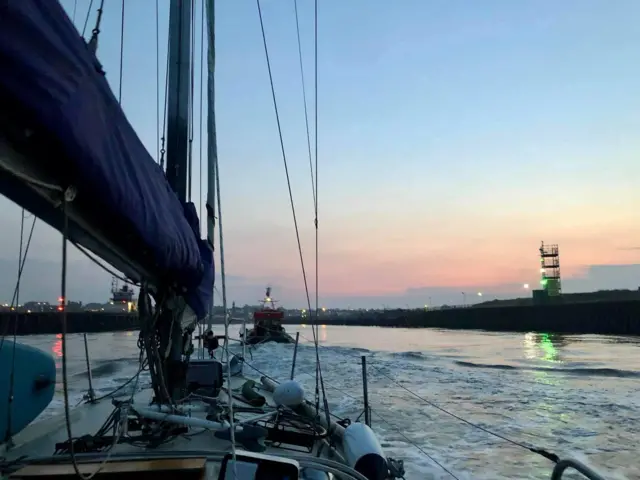 Caister Lifeboat tows the rescued yacht to Great Yarmouth