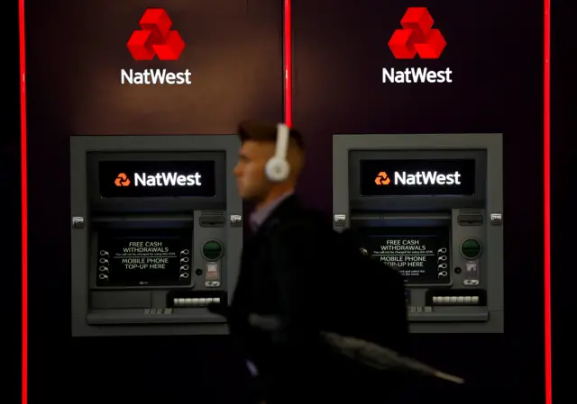 A man outside a NatWest branch in Manchester