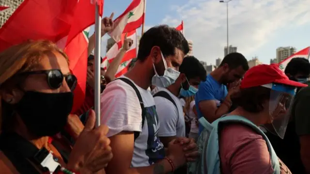 People attend a vigil for the victims of the explosion in Beirut (11 August 2020)