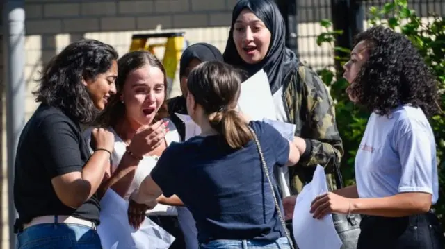 Students celebrating their results together