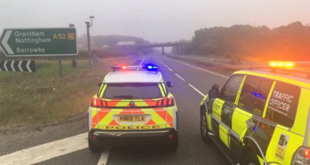 Police vehicles near accident scene