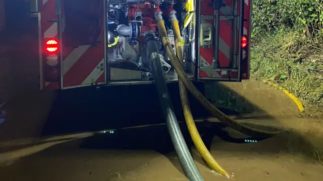 Fire engine at floodwater