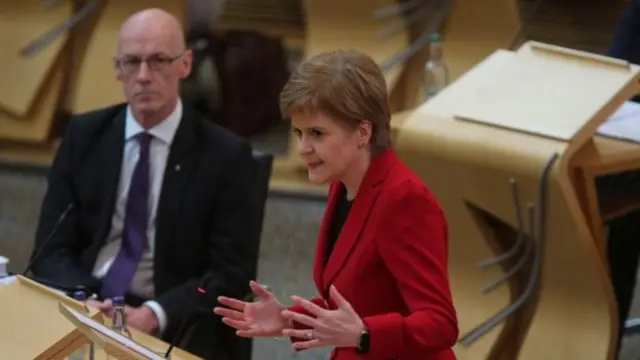 Nicola Sturgeon is standing by John Swinney, who is both education secretary and deputy first minister