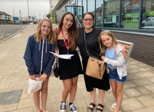 Eve Ford with her mum and sister