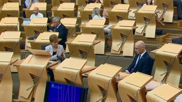 MSPs applaud John Swinney